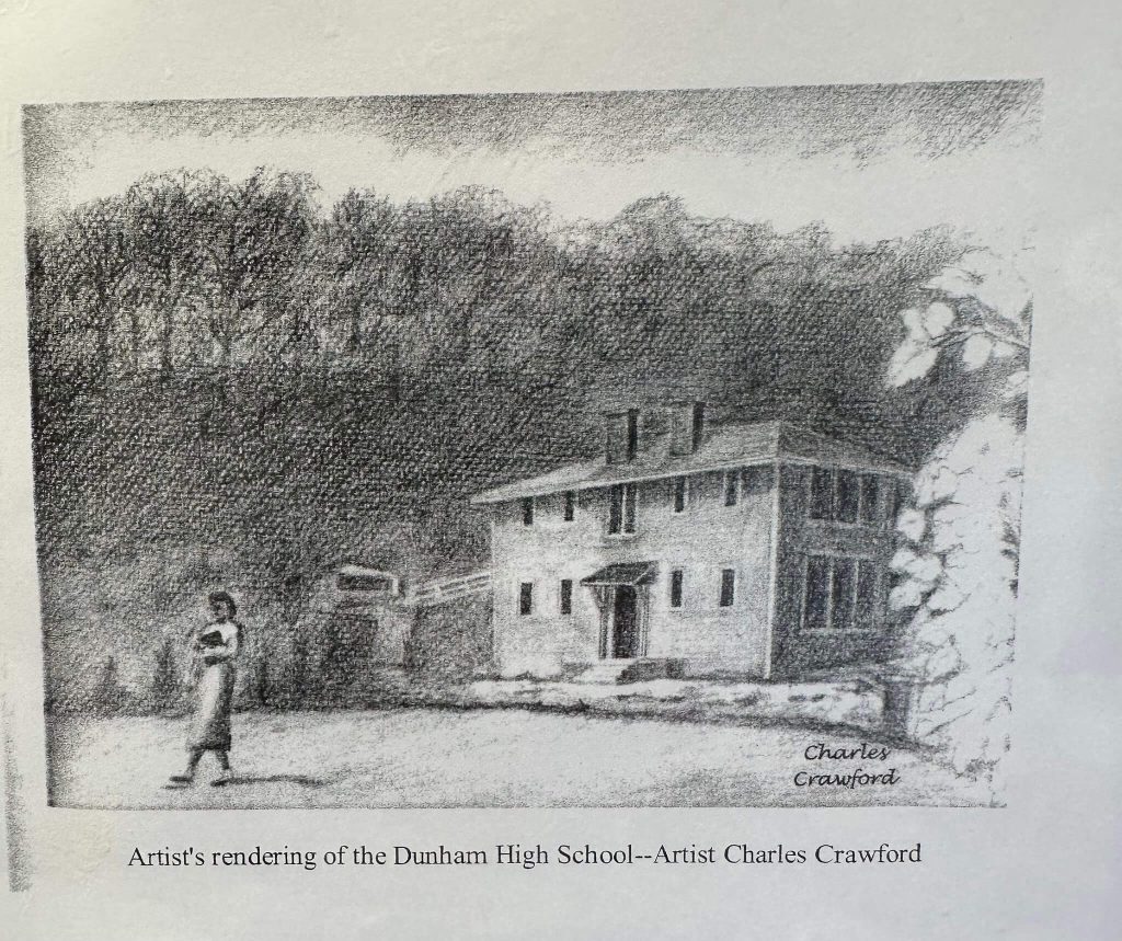 Black-and-white artist rendering of Dunham High School, a two-story frame building on a wooded hillside, with one person walking in the foreground.